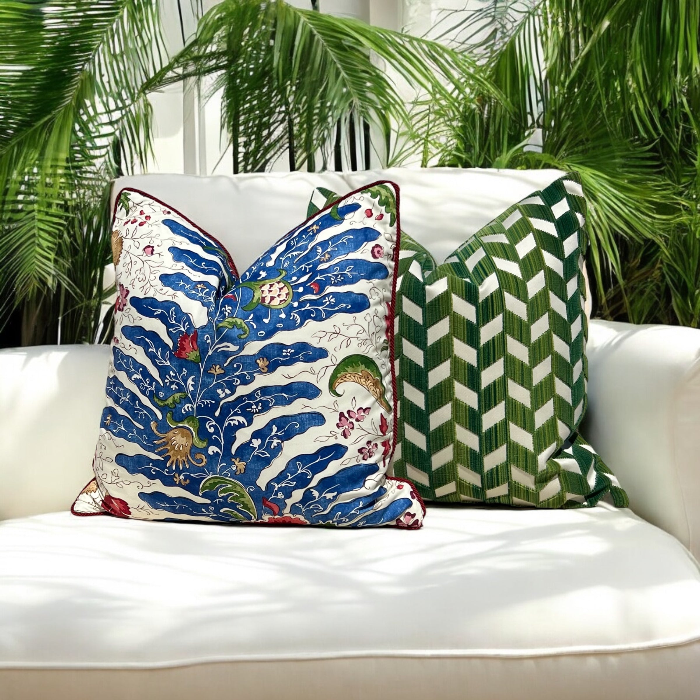 Brunschwig and Fills Riviere Pillow in Red and Blue with Red Twisted Cord Trim.