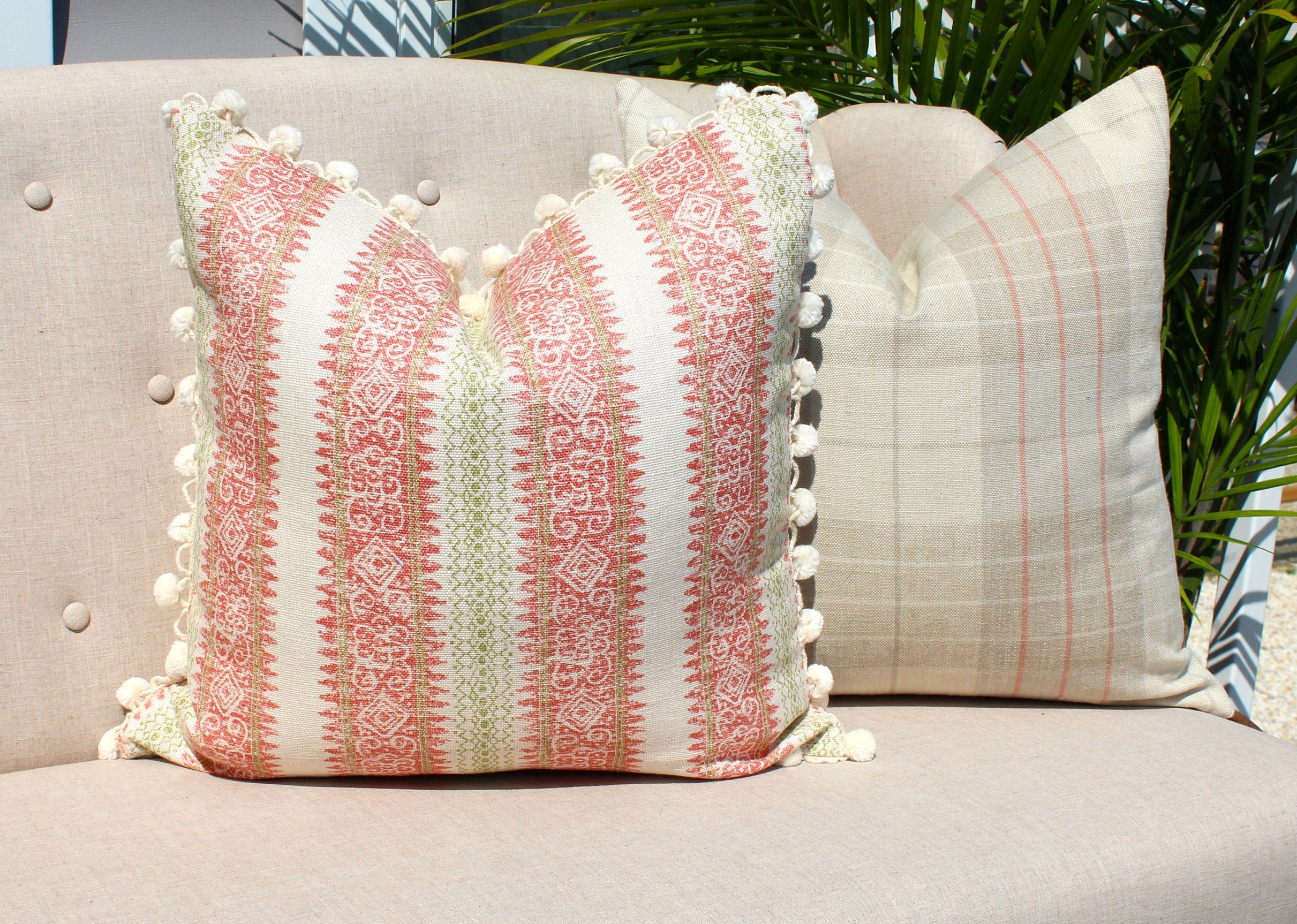Boho Striped Pillow Cover in Coral and Lime Green embellished with Cream Ball Fringe.