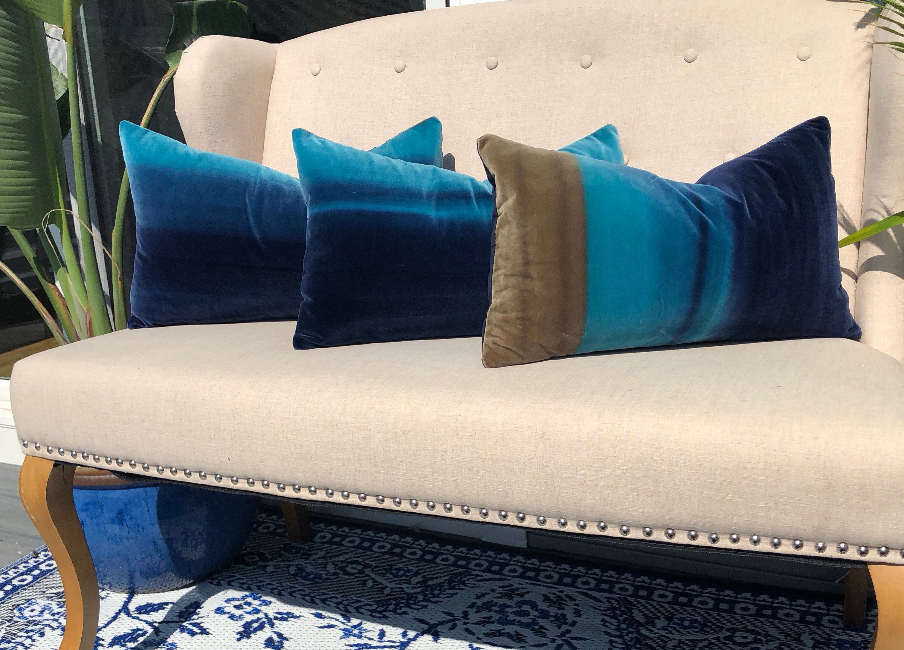 Harlequin Designer Velvet Pillow in Cocoa, Lagoon, Blueberry. Amazilia Lumbar Velvet Pillow Cover Tan, Aqua Blue, Indigo.