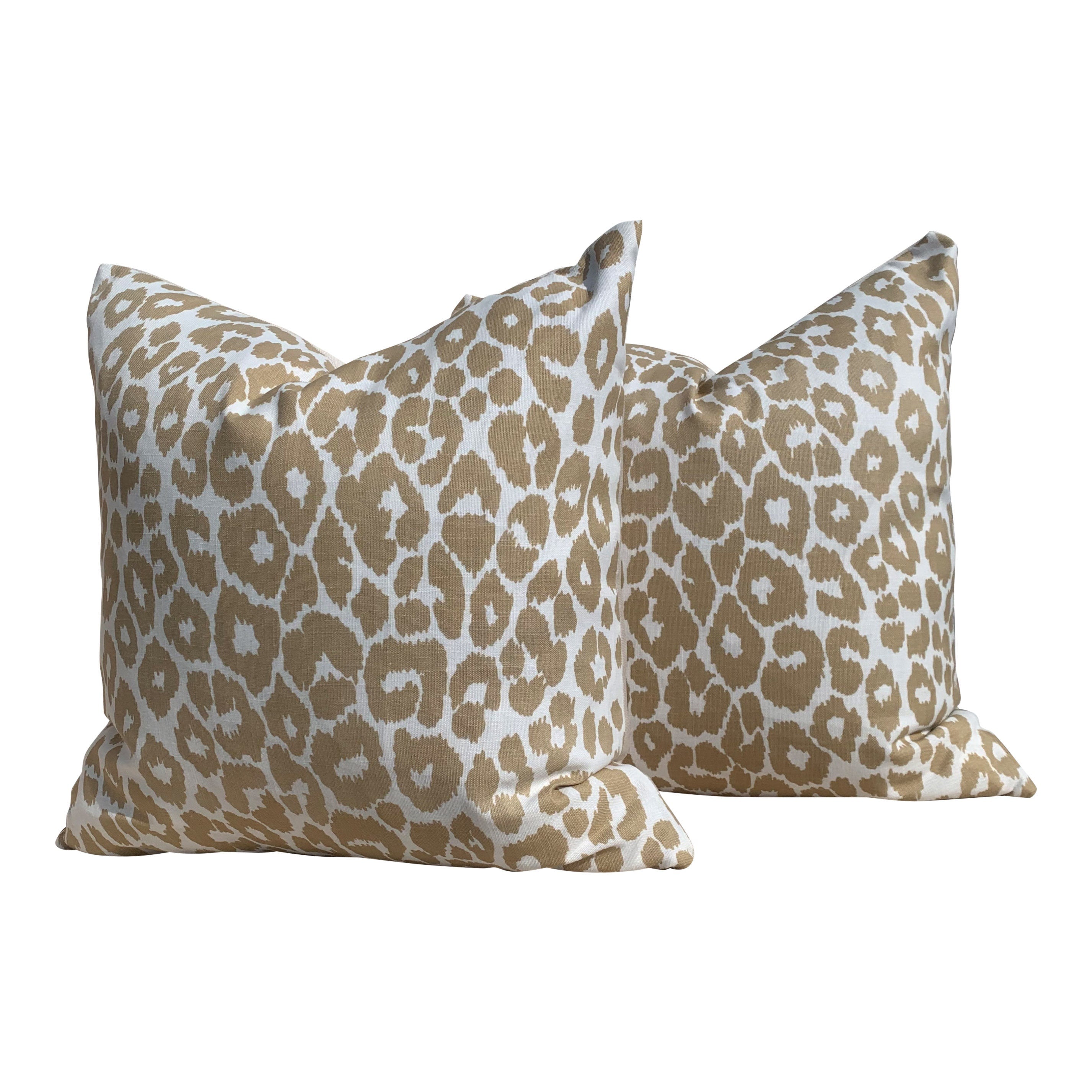 Indoor/Outdoor Schumacher Leopard Pillow in Tan. Animal Print Outdoor lumbar Pillow in Beige.