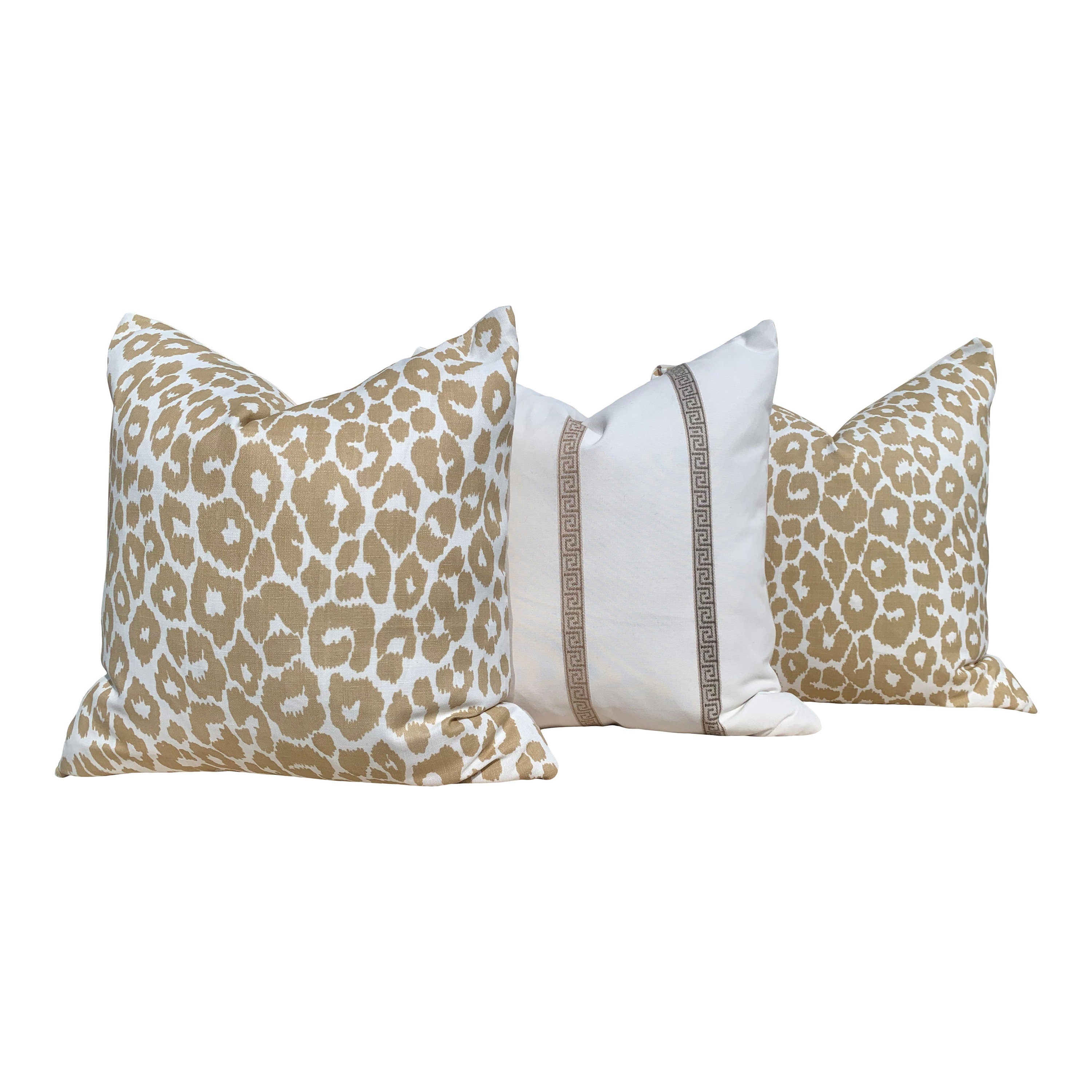 Indoor/Outdoor Schumacher Leopard Pillow in Tan. Animal Print Outdoor lumbar Pillow in Beige.