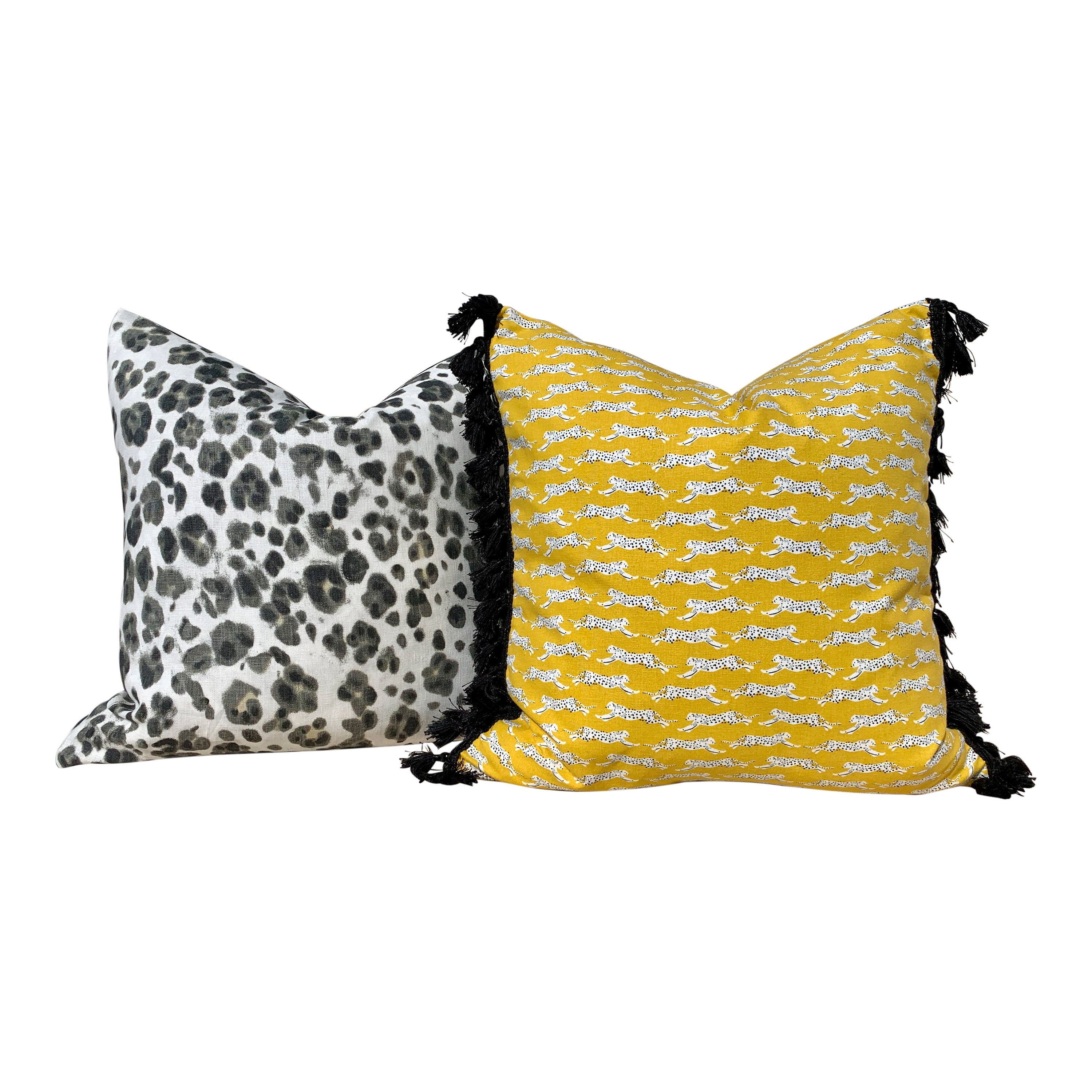 Schumacher Leaping Leopards Pillow in Yellow with Black Tassels. Designer pillows, accent cushion cover, decorative pillow, high end pillow