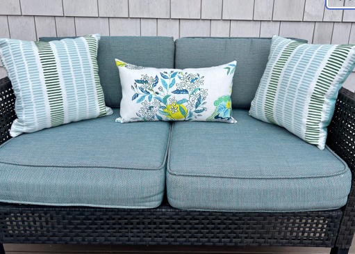Indoor/Outdoor Woven Striped Pillow in Aqua and Green.