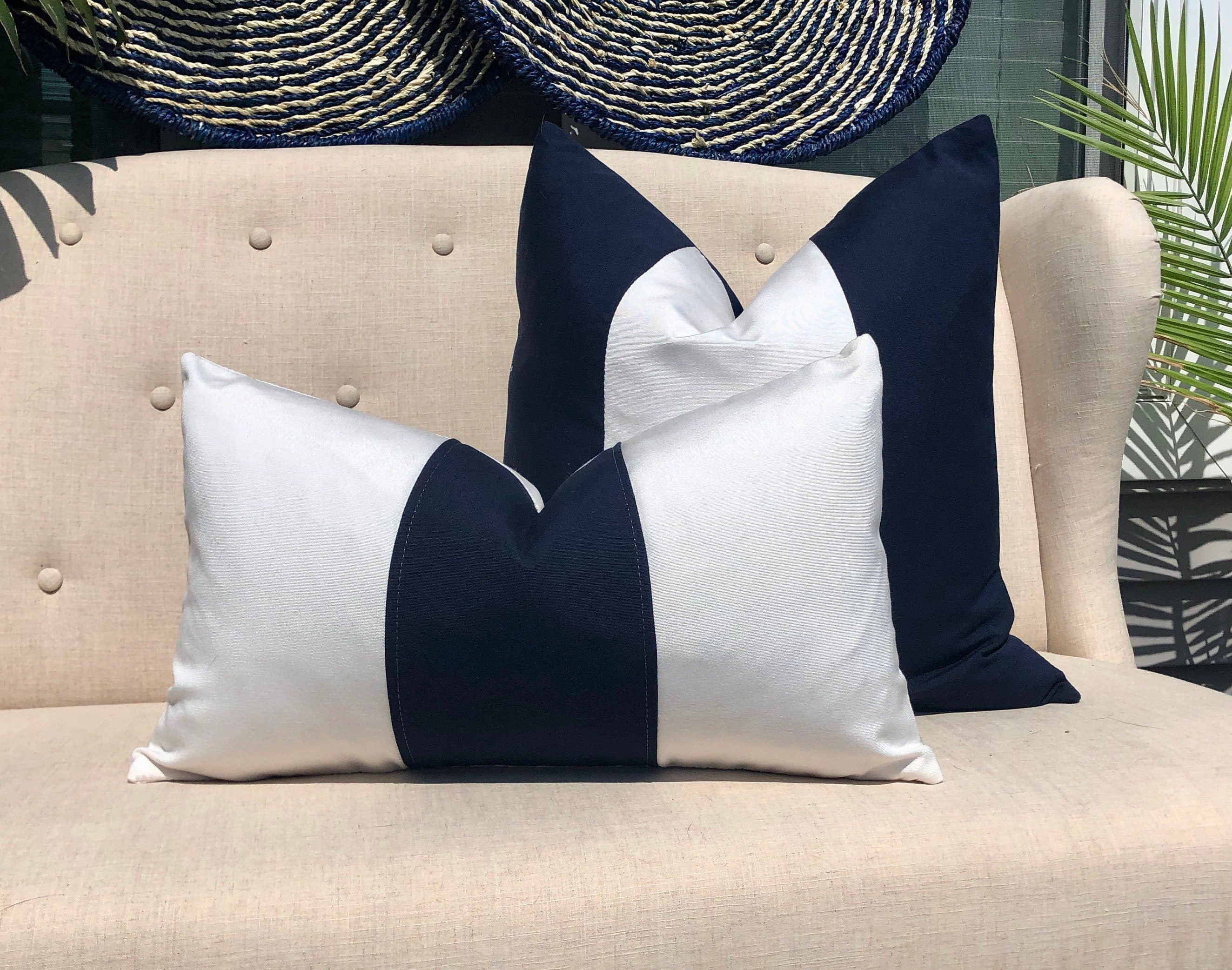 Sunbrella Black and White Striped Outdoor Pillow.