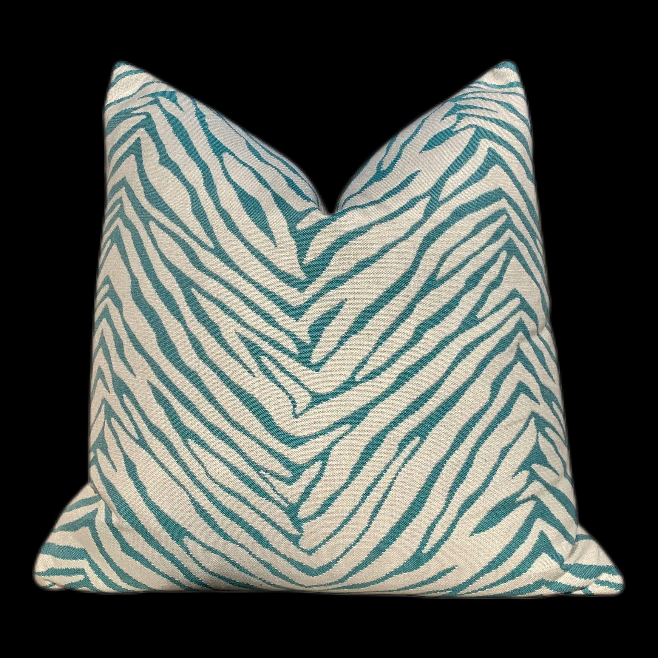 Sunbrella Striped Outdoor Pillowin Aqua. Lumbar Outdoor Pillow in Spa.