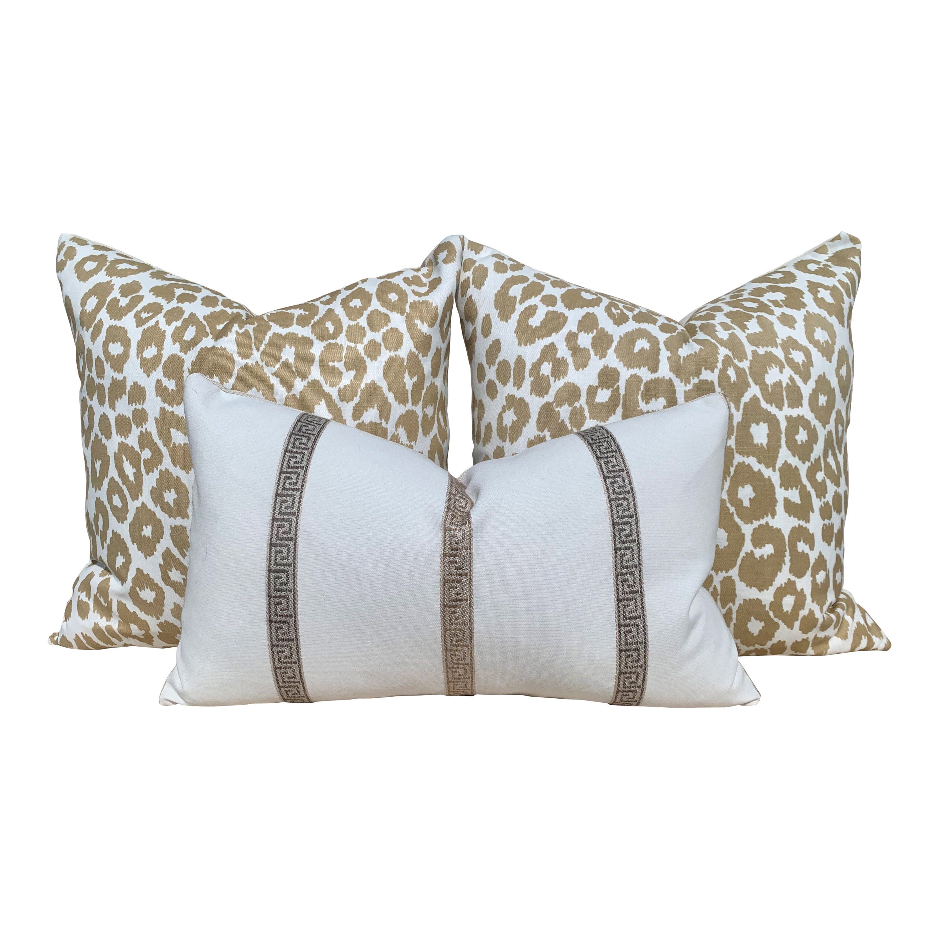 Indoor/Outdoor Schumacher Leopard Pillow in Tan. Animal Print Outdoor lumbar Pillow in Beige.